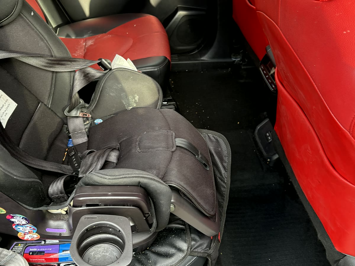 Before photo of a family vehicle back seat before interior detailing