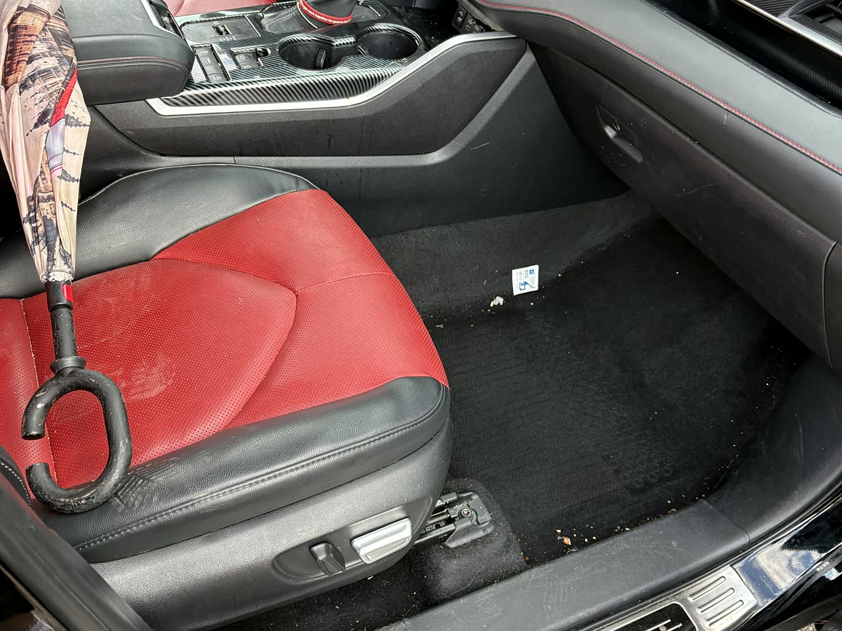 Before photo of a front cabin with dust and daily-driver debris