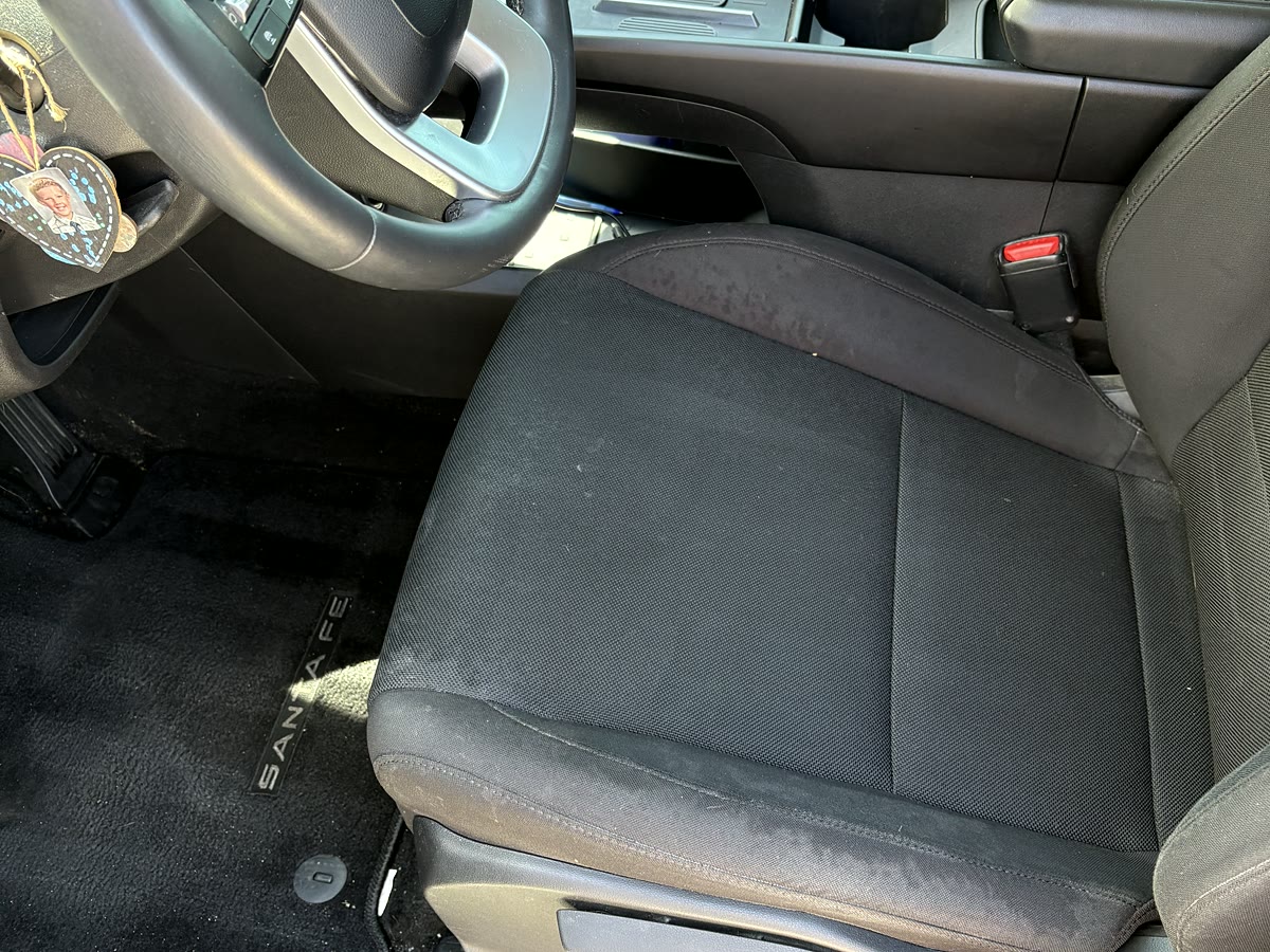 After photo of the same daily-driver interior after detailing